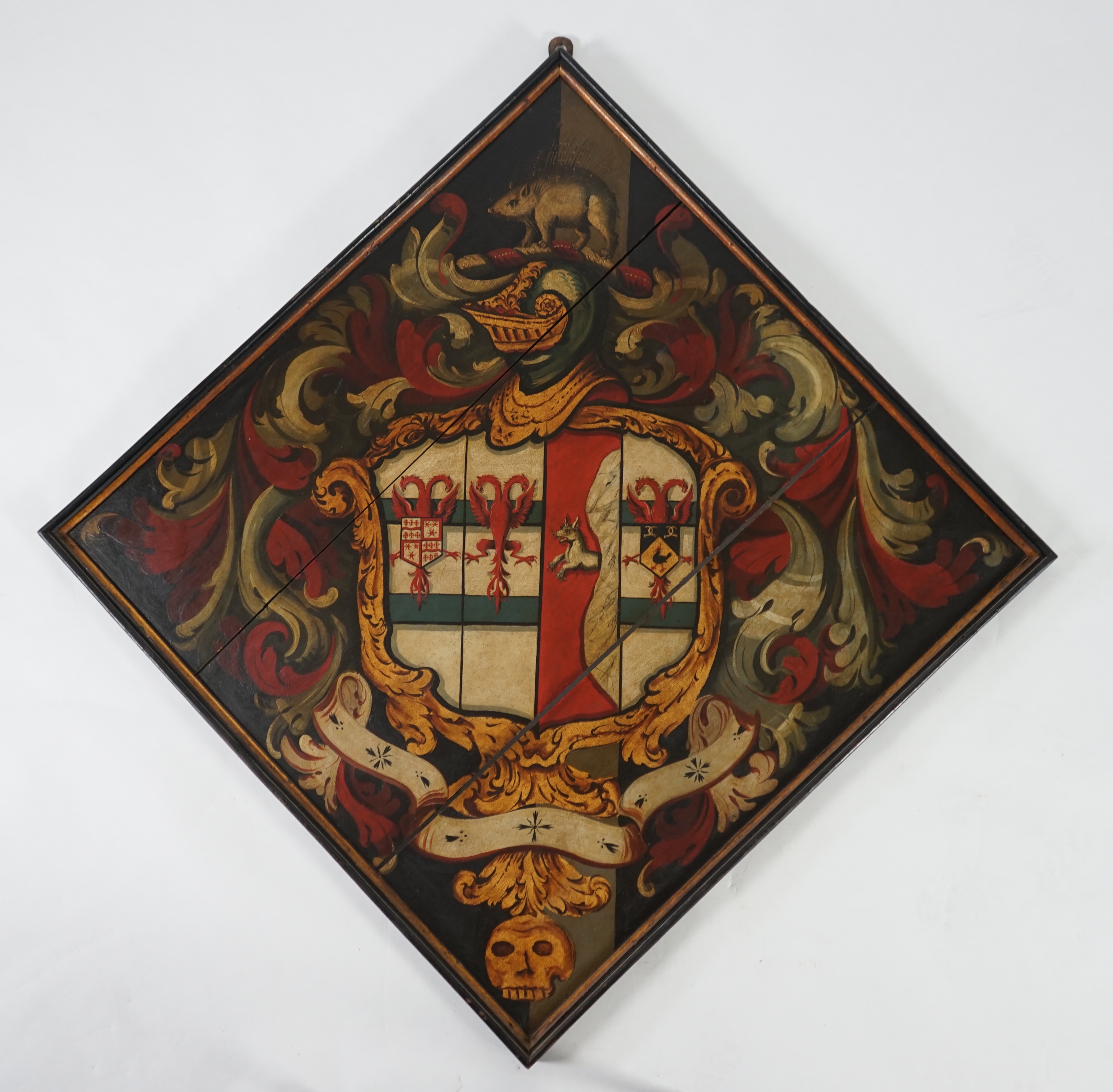 A late 18th / early 19th century oil on wooden panel hatchment